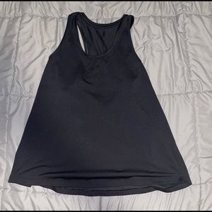 black essential tank top train